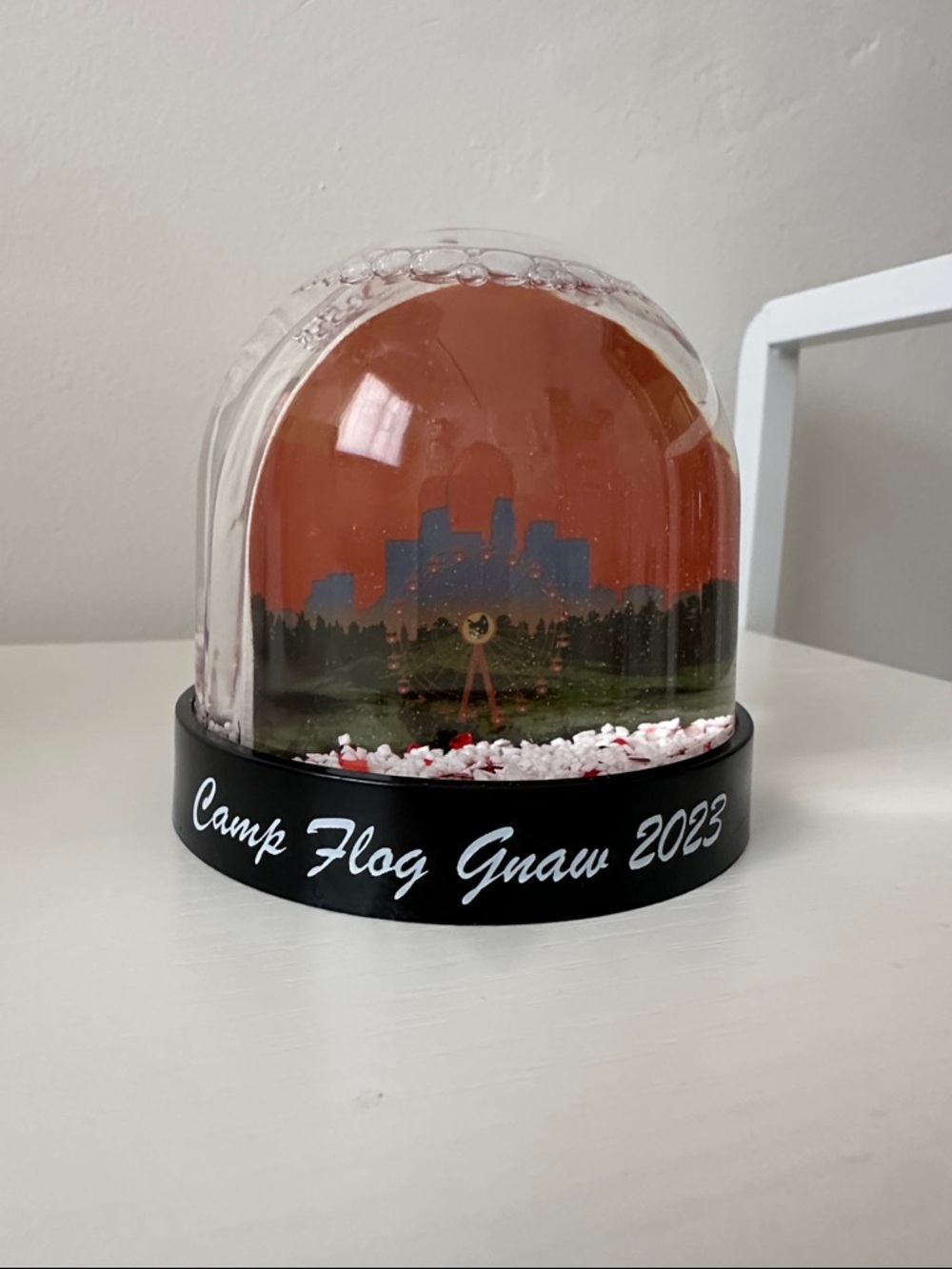 Camp Flog Gnaw snow globe featuring the iconic Los Angeles skyline